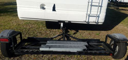 Missing right tail light and hole in the back of the motorhome.