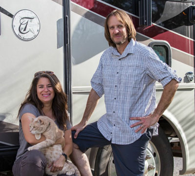 Camille, her husband, Bryce, and their cat, Parker