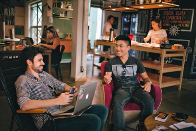 People work and socialize in coffee shops