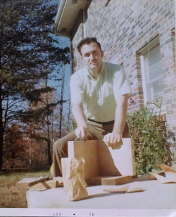 Me working on a project many years ago when I had hair