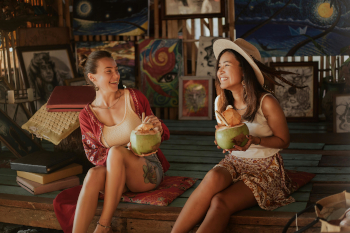 Locals enjoying coconut water